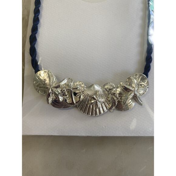 NAVY Jewelry - NEW $244 Betsy Frost seashell silver plated necklace on 18” navy braided rope